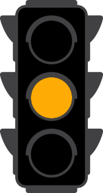 traffic light with yellow light lit up